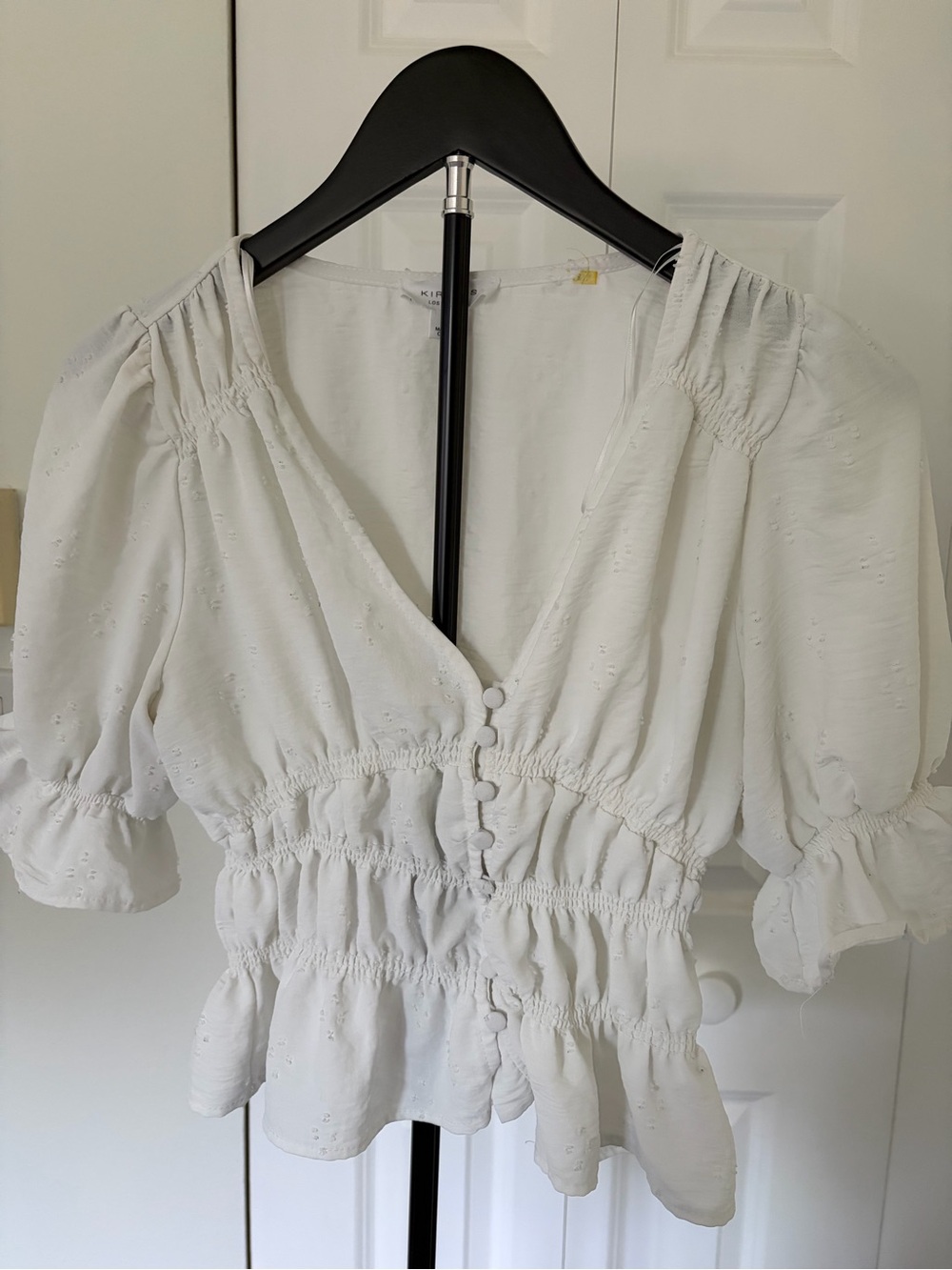 Smocked White Puff-Sleeve Peplum Blouse